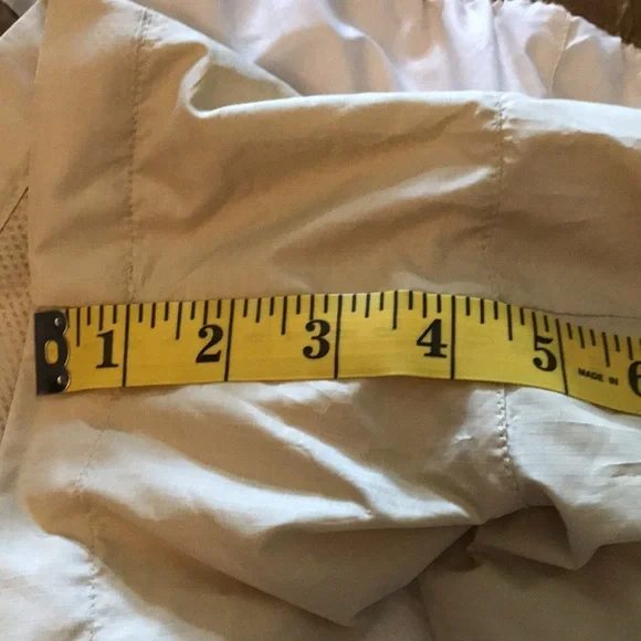 North Face Women's Tan Shorts with Brown Waistband - Picture 7 of 7